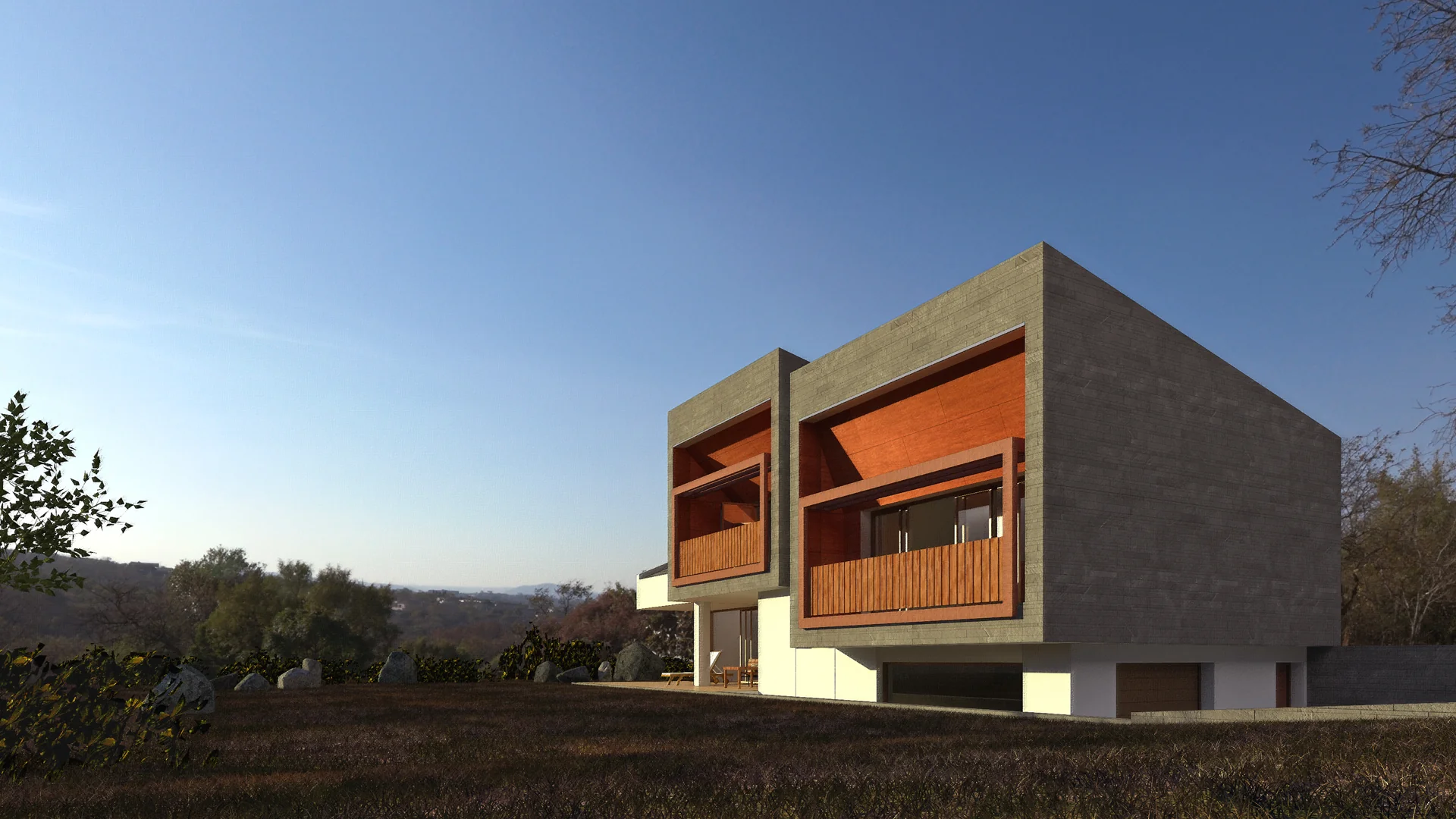 Casa en la Sierra de Madrid con volúmenes fragmentados en piedra filita gris e integración topográfica en Robledo de Chavela.