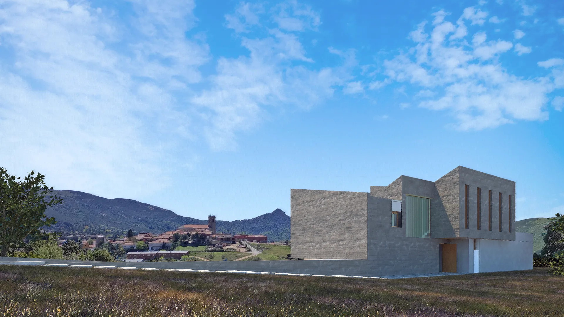Casa en Robledo de Chavela construida con piedra filita gris integrada en el entorno urbano y natural de la Sierra de Madrid.
